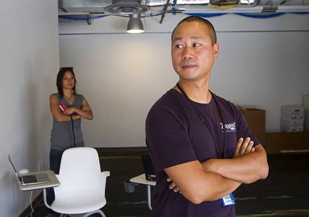 Zappos CEO Tony Hsieh looks over the Monkey Room where he has his office at the Zappos headquarters in the old city hall building downtown Monday, Sept. 9, 2013. The downtown headquarters officially opened Monday.