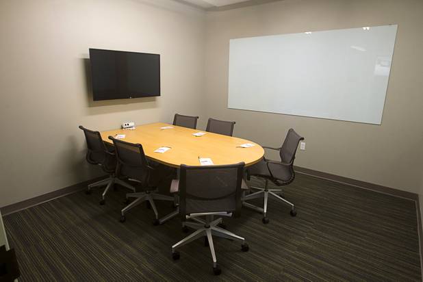 A traditional-styled conference room is shown during a tour of the Zappos headquarters in the old city hall building downtown Monday, Sept. 9, 2013. The conference is adjacent to a more casual conference room. The downtown headquarters officially opened Monday.