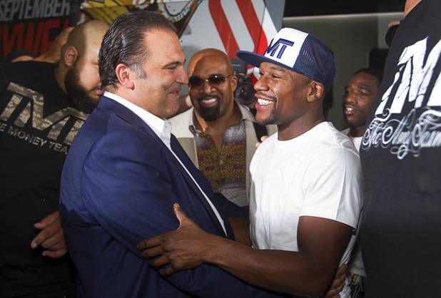 Richard Schaefer, CEO of Golden Boy Promotions, greets undefeated boxer Floyd Mayweather Jr. at MGM Grand on Tuesday, Sept. 10, 2013. Mayweather will face Canelo Alvarez of Mexico in a WBC/WBA 154-pound title fight at MGM Grand Garden Arena on Sept. 14. 