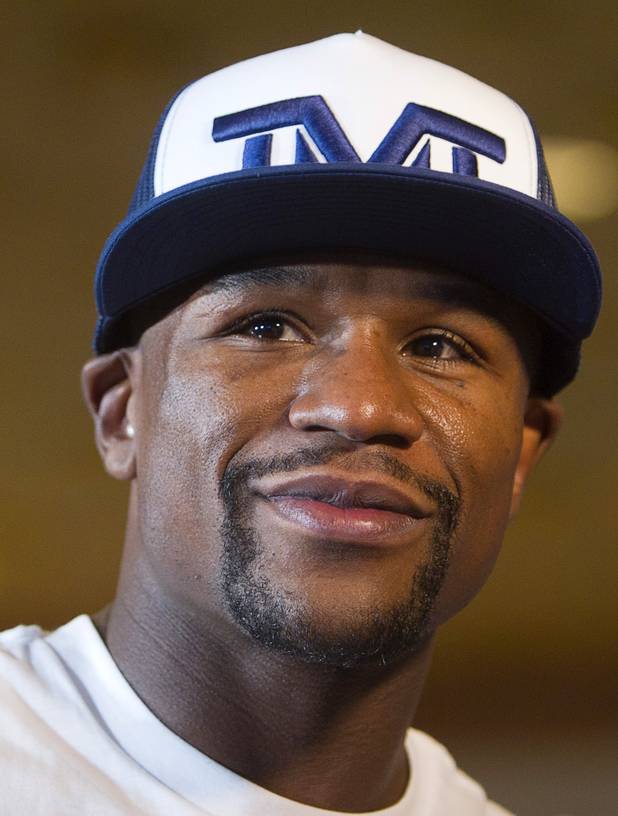 Undefeated boxer Floyd Mayweather Jr. is shown during his grand arrival at the MGM Grand Tuesday, Sept. 10, 2013. Mayweather will face Canelo Alvarez of Mexico in a WBC/WBA 154-pound title fight at the MGM Grand Garden Arena on Saturday.