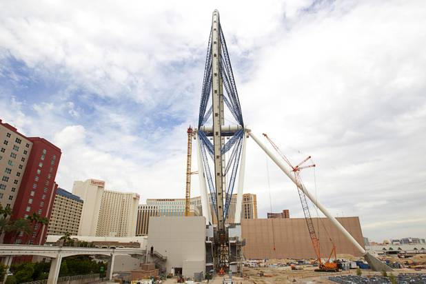 The High Roller observation wheel is shown under construction Tuesday, September 10, 2013. The final segment of the outer wheel was installed Tuesday. The 550-foot tall observation wheel, which will be the tallest in the world when completed, is the centerpiece of of the $550 million Linq entertainment district being built by Caesars Entertainment Corp.