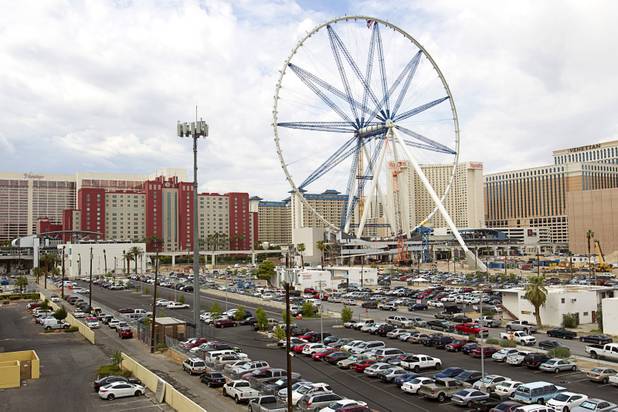 The High Roller observation wheel is shown under construction Tuesday, Sept. 10, 2013. The final segment of the outer wheel was installed Tuesday. The 550-foot-tall observation wheel, which will be the tallest in the world when completed, is the centerpiece of the $550 million Linq entertainment district being built by Caesars Entertainment.