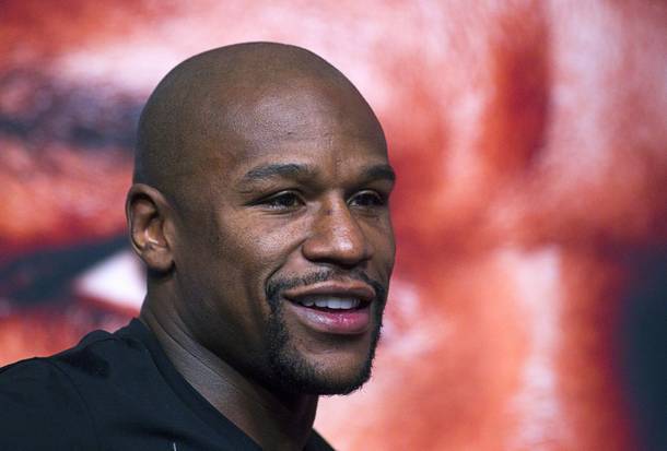 Undefeated boxer Floyd Mayweather Jr. attends a news conference at MGM Grand on Wednesday, Sept. 11, 2013. 