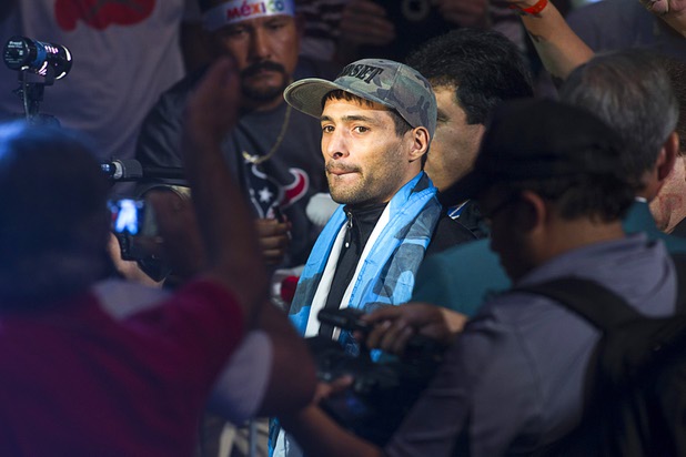Boxer Lucas Matthysse of Argentina arrives during an official weigh-in at the MGM Grand Garden Arena Friday Sept. 13, 2013. Matthysse will challenge WBC/WBA junior welterweight champion Danny Garcia for his titles at the arena Saturday.