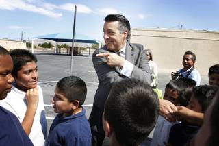 Governor Brian Sandoval talks to a fifth grade class while touring Manuel Cortez Elementary School in Las Vegas on Friday, September 13, 2013.