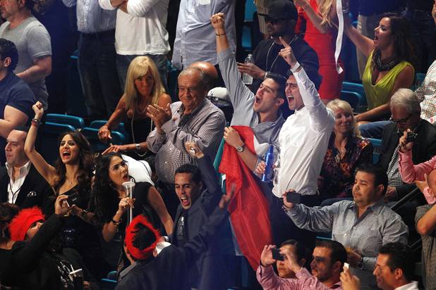Fans cheer as Floyd Mayweather and Canelo Alvarez are introduced before their super welterweight title fight Saturday, Sept. 14, 2013 at the MGM Grand Garden Arena. Mayweather won the fight with a majority decision.