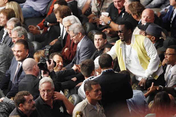 Sean Combs shakes hands before the Floyd Mayweather Canelo Alvarez super welterweight title fight Saturday, Sept. 14, 2013 at the MGM Grand Garden Arena. Mayweather won the fight with a majority decision.