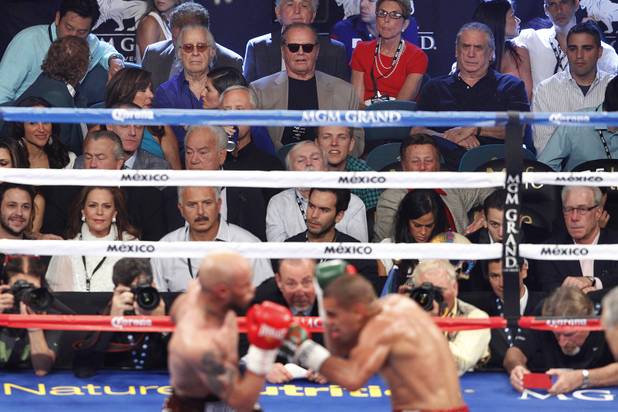 Jack Nicholson, top center, watches the Ishe Smith vs. Carlos Molina fight Saturday, Sept. 14, 2013 at the MGM Grand Garden Arena.