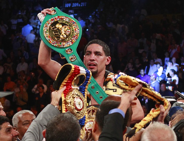 WBC/WBA junior welterweight champion Danny Garcia celebrates his victory over Lucas Matthysse of Argentina at the MGM Grand Garden Arena Saturday, Sept. 14, 2013.