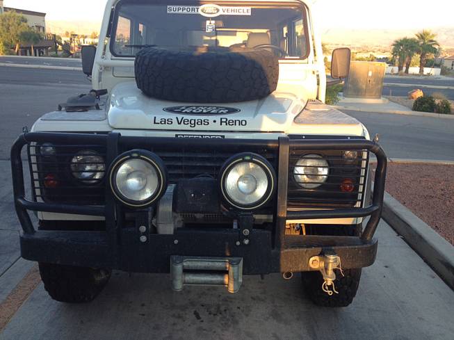 The 1997 Land Rover Defender is a four-cylinder turbo diesel with a five-speed manual transmission. It's full-time four-wheel drive with an air-locking rear differential. And, no, it's not for sale - it's on loan from Land Rover Las Vegas.