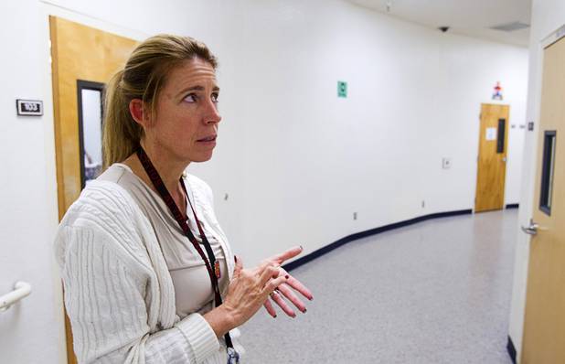 Misti Taton, principal at Cashman Middle School, looks up in a hallway during a tour of the school Tuesday, Sept. 17, 2013. The age of the school has lead to numerous problems with air flow, plumbing, and the electrical system, she said.