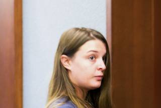 Mary Elizabeth Pitrello appears in court at the Regional Justice Center, Tuesday, Sept. 17, 2013. Pitrello is being charged with first-degree murder for the killing of her roommate at their Las Vegas apartment.