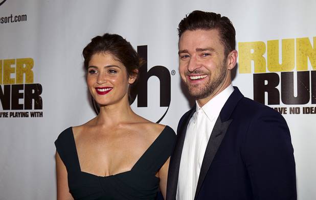Actress Gemma Arterton and singer/actor Justin Timberlake arrive for the world premiere of the Twentieth Century Fox and New Regency film "Runner Runner" at Planet Hollywood on Wednesday, Sept. 18, 2013.