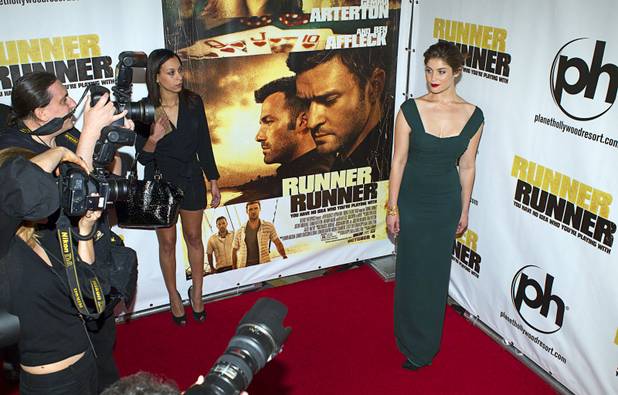 Actress Gemma Arterton arrives for the world premiere of the Twentieth Century Fox and New Regency's film "Runner Runner" at Planet Hollywood Wednesday, September 18, 2013.