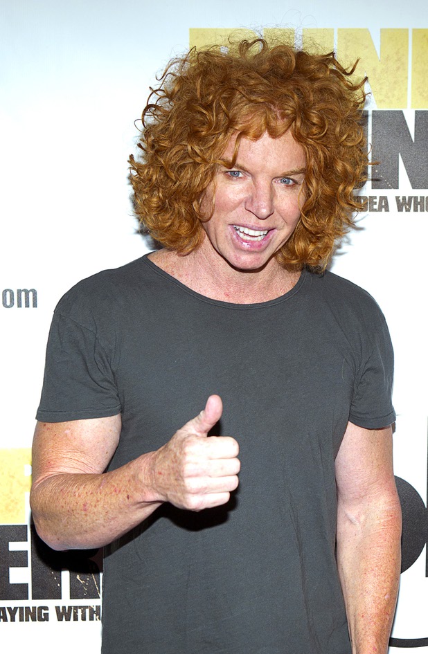 Comedian Carrot Top arrives for the world premiere of the Twentieth Century Fox and New Regency's film "Runner Runner" at Planet Hollywood Wednesday, September 18, 2013.