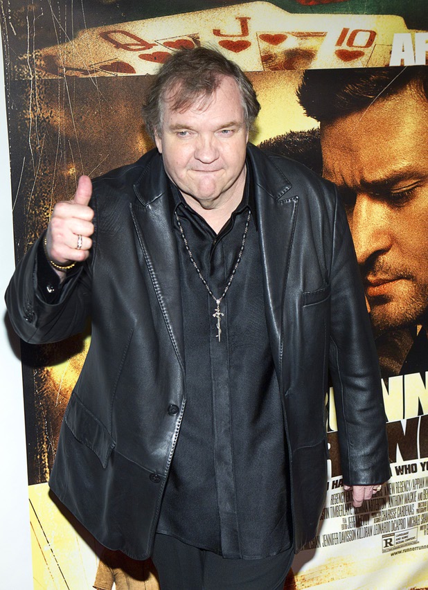 Meat Loaf arrives for the world premiere of “Runner, Runner” at Planet Hollywood on Wednesday, Sept. 18, 2013.
