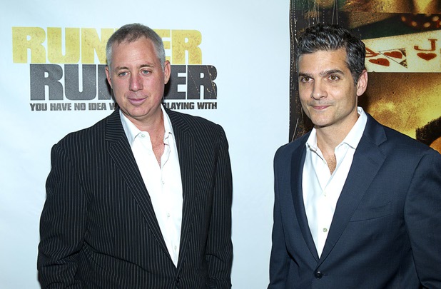 Writers Brian Koppelman, left, and David Levien arrive for the world premiere of the Twentieth Century Fox and New Regency's film "Runner Runner" at Planet Hollywood Wednesday, September 18, 2013.