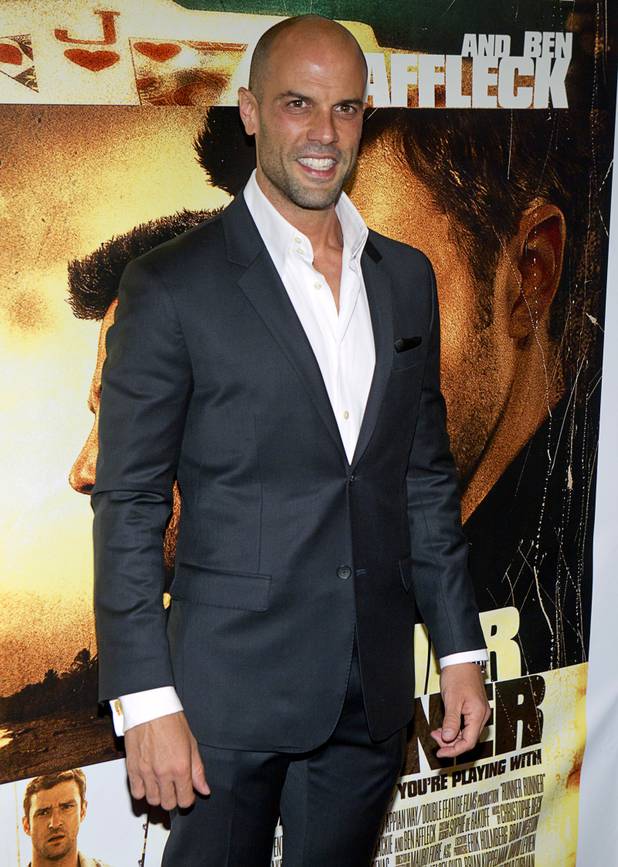 Actor Christian George arrives for the world premiere of the Twentieth Century Fox and New Regency's film "Runner Runner" at Planet Hollywood Wednesday, September 18, 2013. 