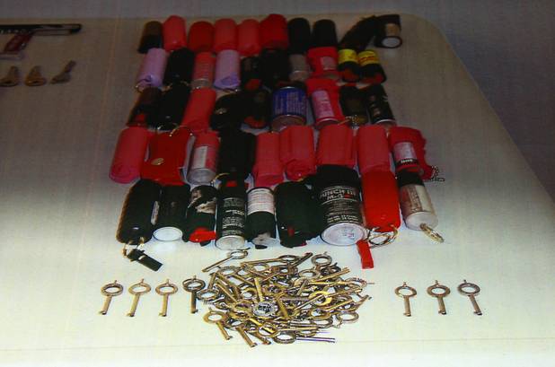 A courtesy photo shows handcuff keys and pepper spray confiscated in August at the Regional Justice Center Thursday, September 19, 2013.