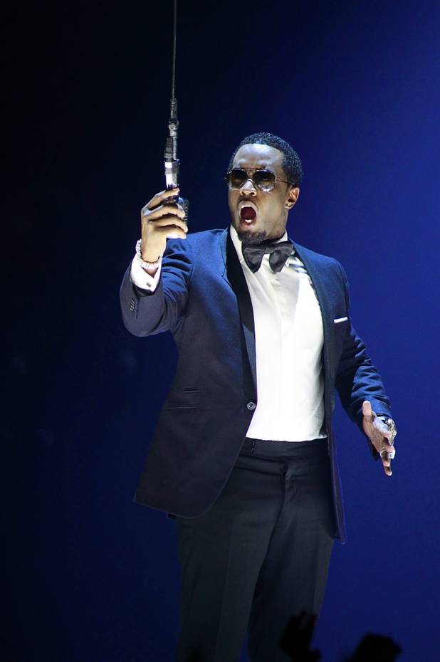Sean "P. Diddy" Combs introduces Robin Thicke during the iHeartRadio Music Festival at the MGM Grand Garden Arena Friday, Sept. 20, 2013.