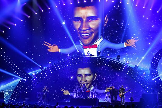 Muse performs during the iHeartRadio Music Festival at the MGM Grand Garden Arena Friday, Sept. 20, 2013.