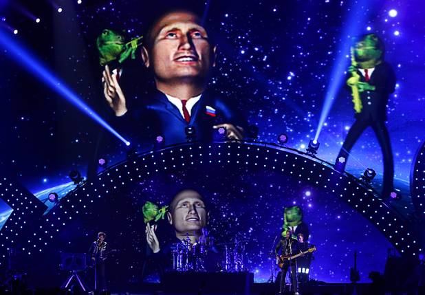 Muse performs during the iHeartRadio Music Festival at the MGM Grand Garden Arena Friday, Sept. 20, 2013.
