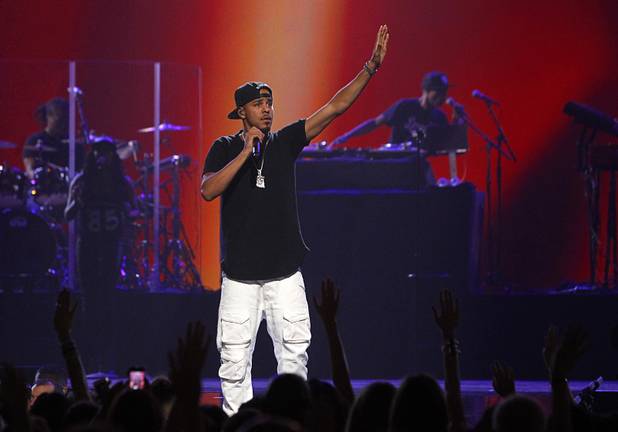 Rapper J. Cole performs during the iHeartRadio Music Festival at the MGM Grand Garden Arena Friday, Sept. 20, 2013.