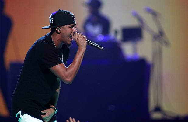 Rapper J. Cole performs during the iHeartRadio Music Festival at the MGM Grand Garden Arena Friday, Sept. 20, 2013.