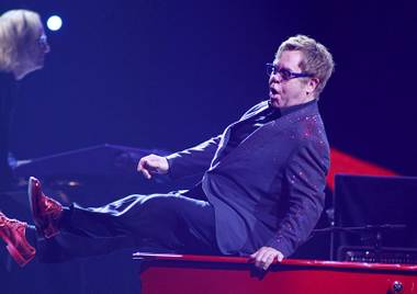 Elton John performs during the iHeartRadio Music Festival at the MGM Grand Garden Arena Friday, Sept. 20, 2013.