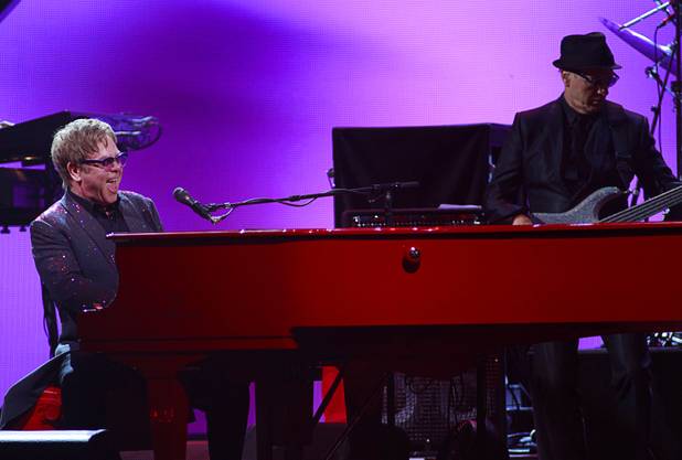 Elton John performs during the iHeartRadio Music Festival at the MGM Grand Garden Arena Friday, Sept. 20, 2013.