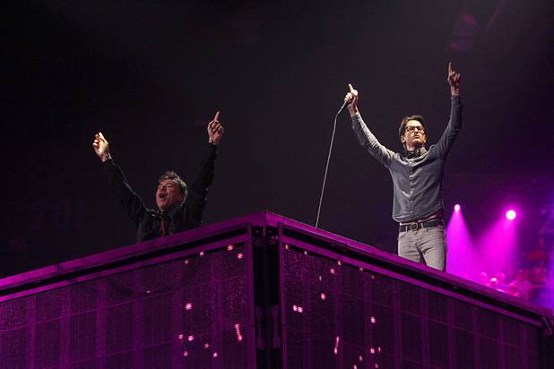 Benny Benassi, left, and Gary Go perform during the iHeartRadio Music Festival at the MGM Grand Garden Arena Friday, Sept. 20, 2013.