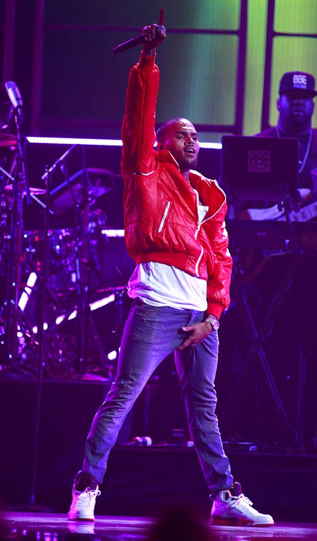 Chris Brown performs during the iHeartRadio Music Festival at the MGM Grand Garden Arena Friday, Sept. 20, 2013.