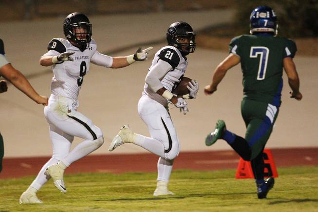 Palo Verde running back Jaren Campbell heads to the end zone during their game against Green Valley Friday, Sept. 20, 2013. Green Valley won the game in overtime 42-41.