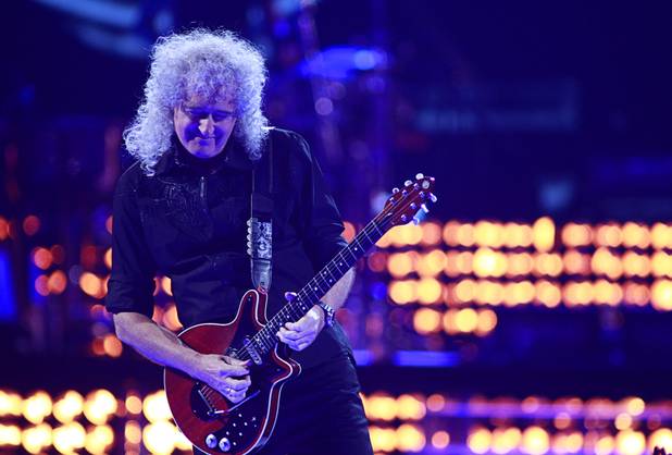 Queen guitarist Brian May performs during the iHeartRadio Music Festival at the MGM Grand Garden Arena Friday, Sept. 20, 2013.