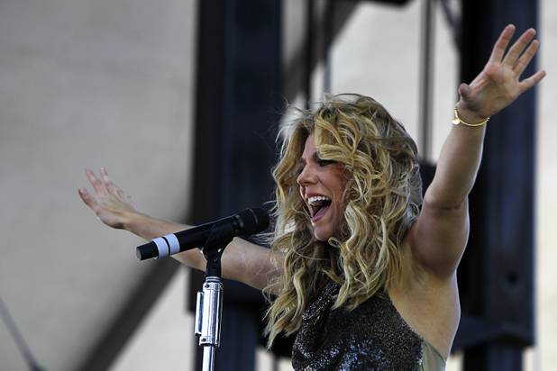 Kimberly Perry of The Band Perry performs in the Village during the iHeartRadio Music Festival Saturday, Sept. 21, 2013.