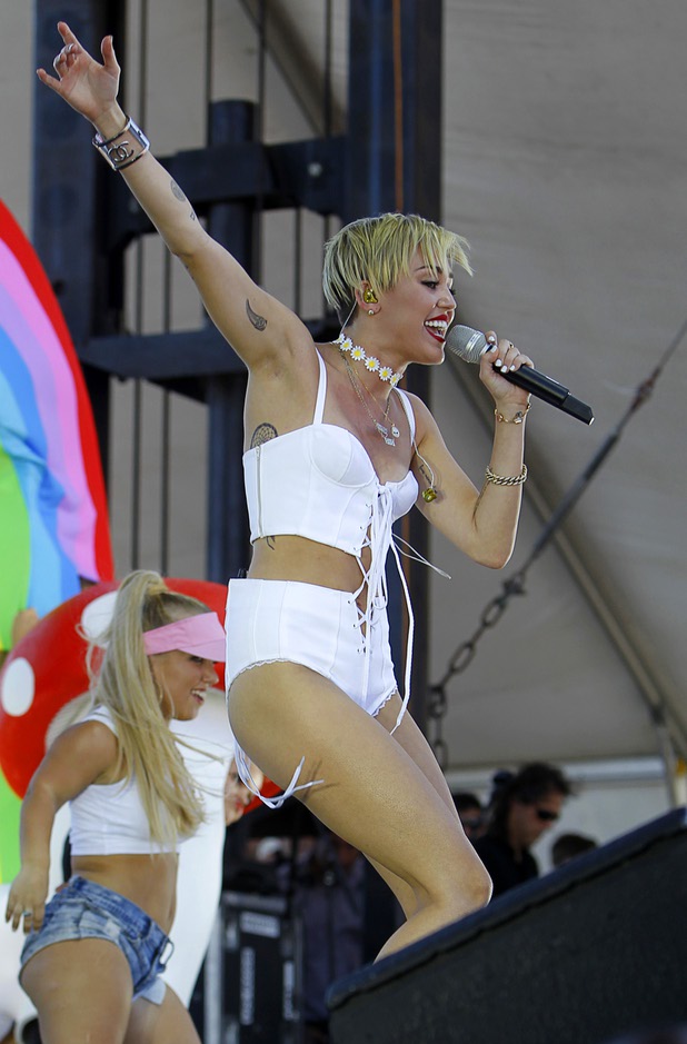 Miley Cyrus performs in the Village during the iHeartRadio Music Festival Saturday, Sept. 21, 2013.