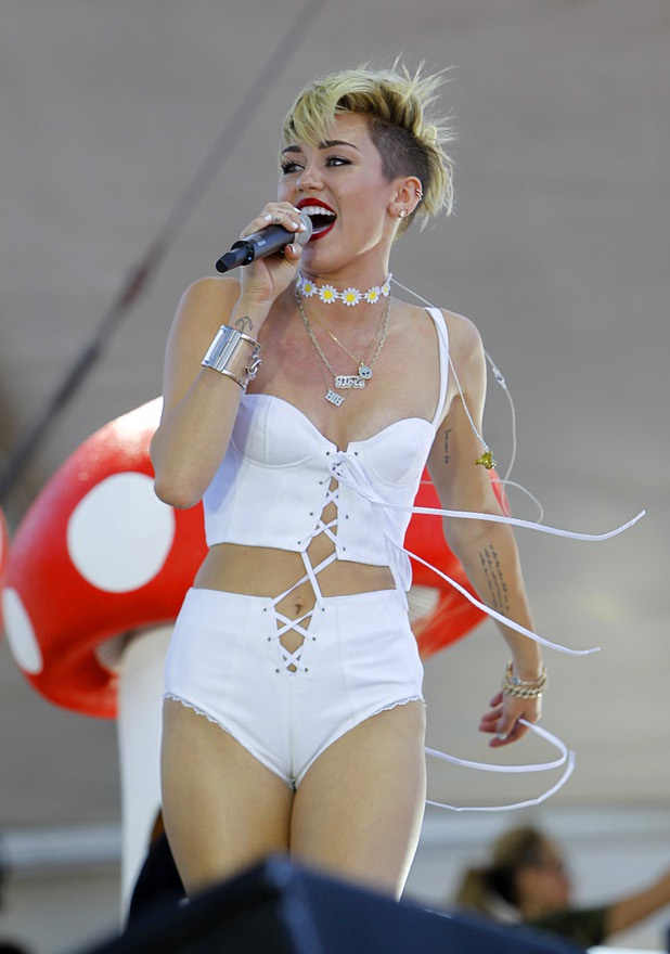 Miley Cyrus performs in the Village during the iHeartRadio Music Festival Saturday, Sept. 21, 2013.