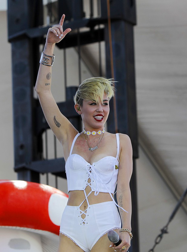 Miley Cyrus performs in the Village during the iHeartRadio Music Festival Saturday, Sept. 21, 2013.