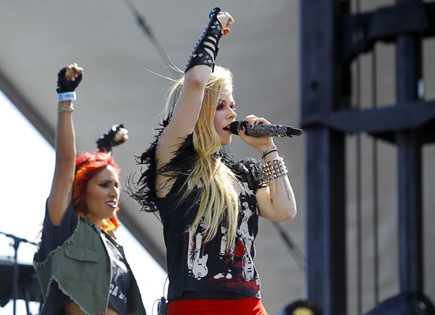 Avril Lavigne performs in the Village during the iHeartRadio Music Festival Saturday, Sept. 21, 2013.