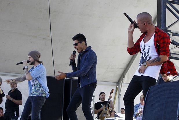 The Wanted performs at The Village across from the Luxor during the 2013 iHeartRadio Music Festival on Saturday, Sept. 21, 2013, in Las Vegas. From left: Jay McGuiness, Siva Kaneswaran and Max George.