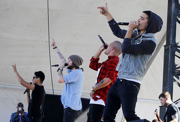 The Wanted performs at The Village across from the Luxor during the 2013 iHeartRadio Music Festival on Saturday, Sept. 21, 2013, in Las Vegas. From left: Siva Kaneswaran, Jay McGuiness, Max George and Tom Parker.