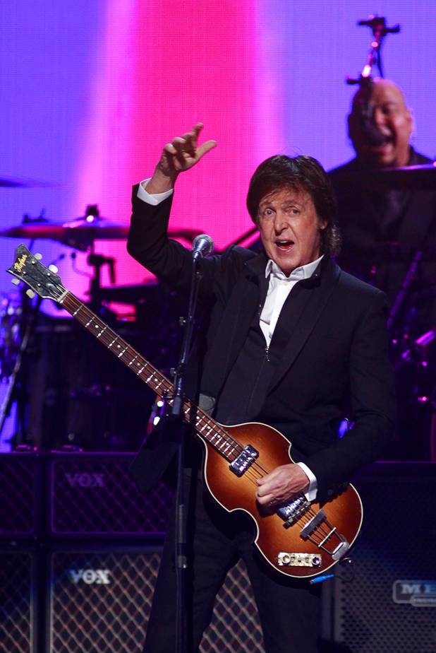 Paul McCartney performs during at the iHeartRadio Music Festival in the MGM Grand Garden Arena Saturday, Sept. 21, 2013.