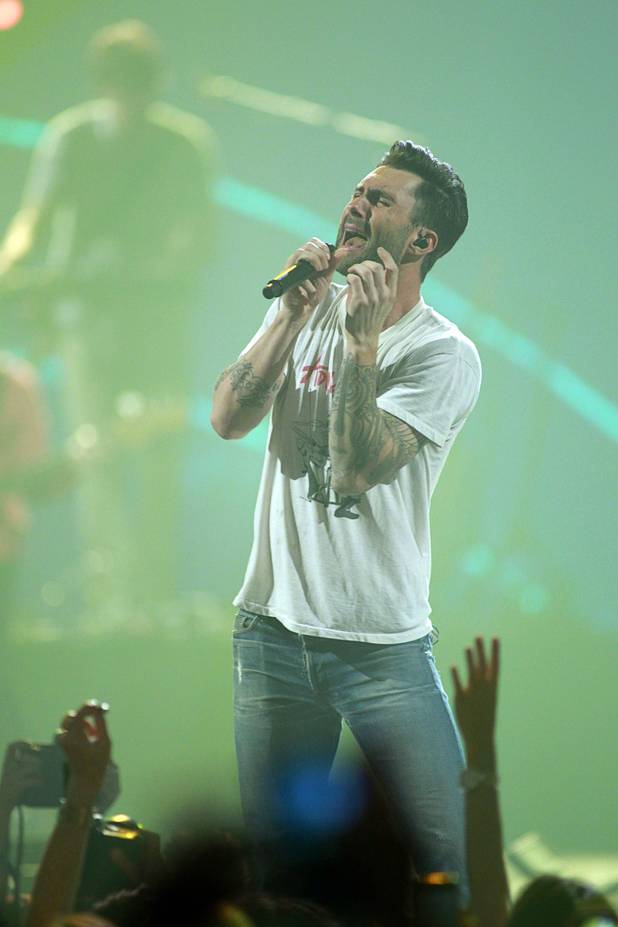 Maroon 5 lead singer Adam Levine performs during the iHeartRadio Music Festival in the MGM Grand Garden Arena Saturday, Sept. 21, 2013.