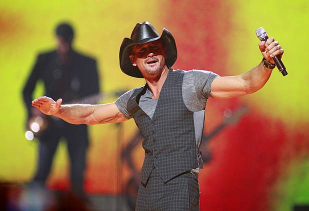 Tim McGraw performs during the 2013 iHeartRadio Music Festival in MGM Grand Garden Arena on Saturday, Sept. 21, 2013.