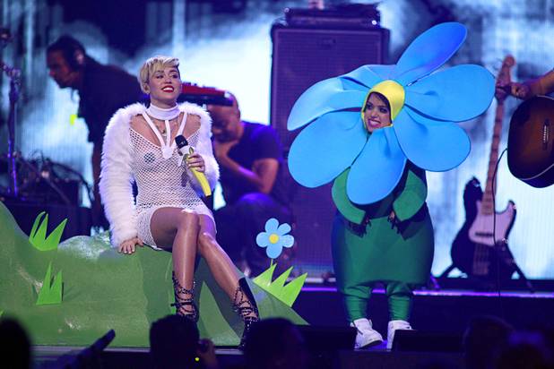 Miley Cyrus performs during the iHeartRadio Music Festival in the MGM Grand Garden Arena Saturday, Sept. 21, 2013.