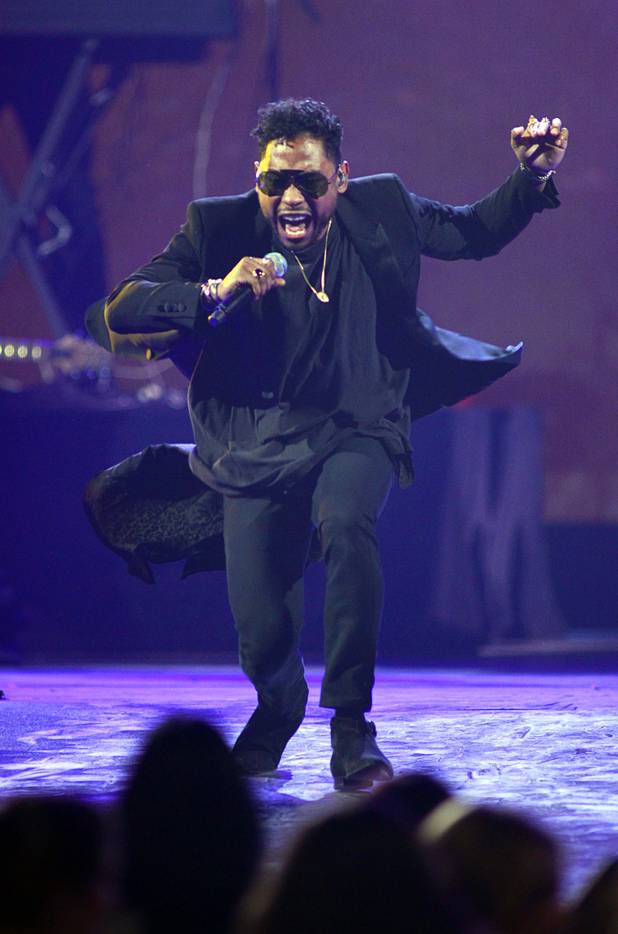 Miguel performs during the iHeartRadio Music Festival in the MGM Grand Garden Arena Saturday, Sept. 21, 2013.