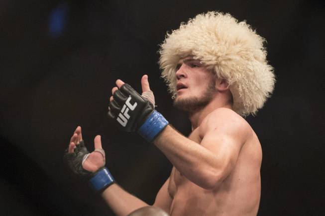 Russia's Khabib Nurmagomedov celebrates after beating Pat Healy in their UFC 165 bout in Toronto on Saturday Sept. 21, 2013. (AP Photo/The Canadian Press, Chris Young)