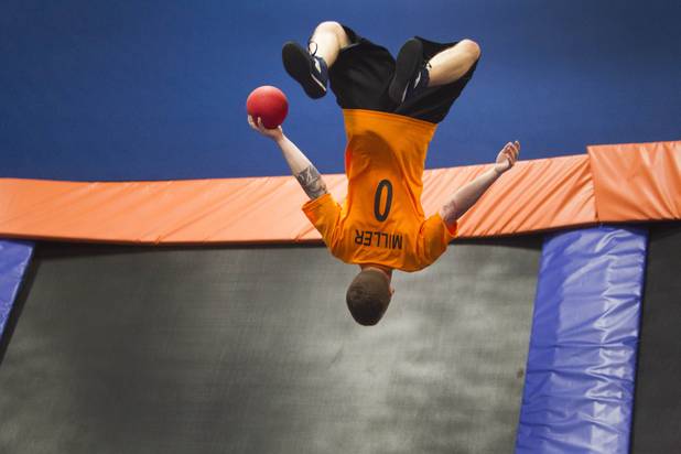 Ryan Miller of Plainfield, Ind. does a flip during the 2013 Ultimate Dodgeball Championship at the SkyZone Las Vegas Trampoline Park, 7440 Dean Martin Dr., Sunday, Sept. 22, 2013. Teams from the U.S. and Canada competed for their share of $50,000 of prize money. The event was filmed for later broadcast on the Fox Sports Network.