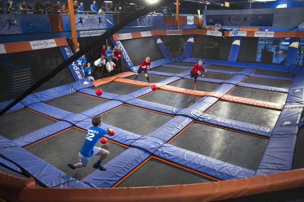 Austin Morley of Grand Rapids, Mich. struggles to stay in a semifinal game against a Toronto team during the 2013 Ultimate Dodgeball Championship at the SkyZone Las Vegas Trampoline Park, 7440 Dean Martin Dr., Sunday, Sept. 22, 2013. Teams from the U.S. and Canada competed for their share of $50,000 of prize money. The event was filmed for later broadcast on the Fox Sports Network.