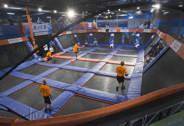 A team from Plainfield (Ind.), left, plays against Grand Rapids (Mich.) team during the 2013 Ultimate Dodgeball Championship at the SkyZone Las Vegas Trampoline Park, 7440 Dean Martin Dr., Sunday, Sept. 22, 2013. Teams from the U.S. and Canada competed for their share of $50,000 of prize money. The event was filmed for later broadcast on the Fox Sports Network.